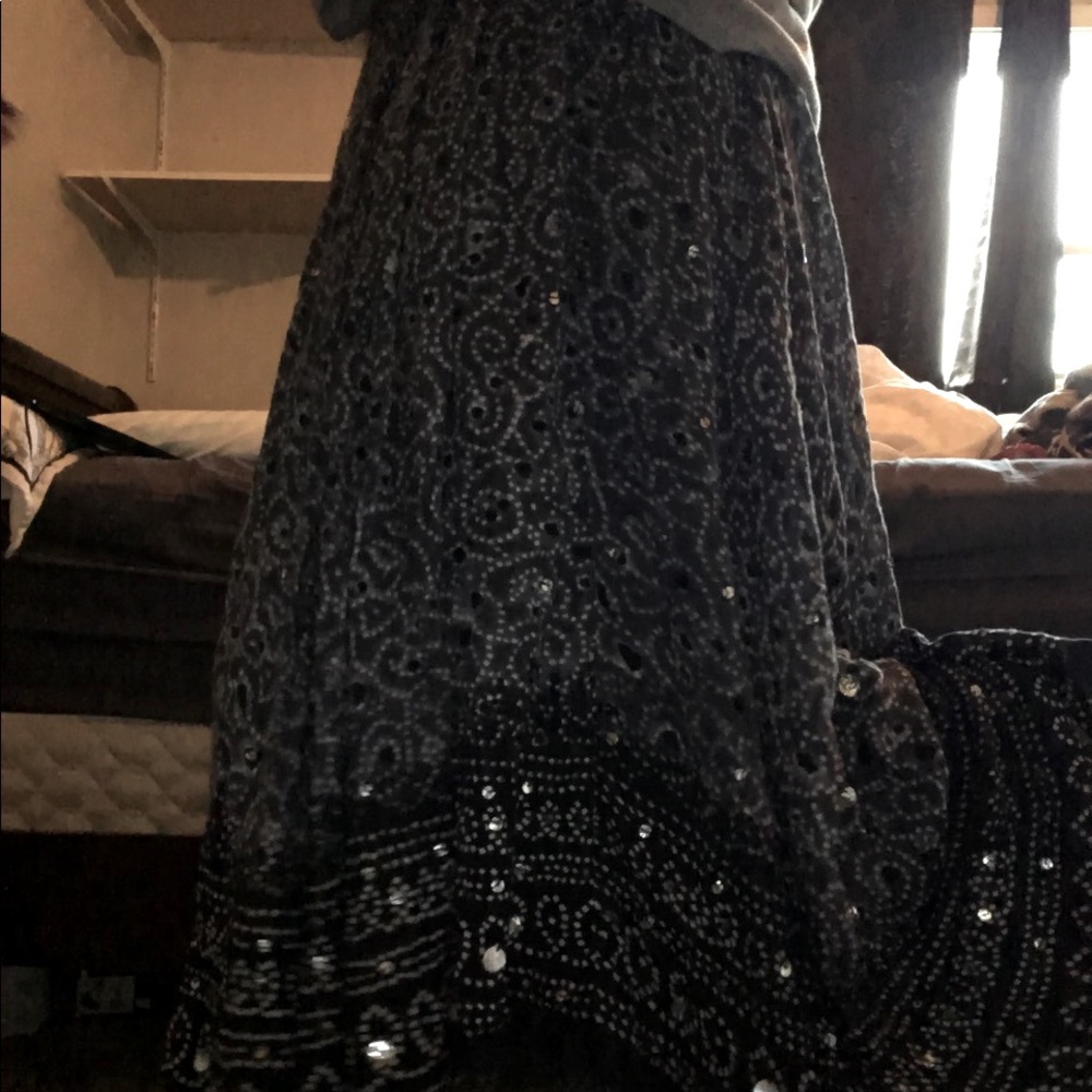 Gray, black, and white maxi skirt. Scattered silver sequins.